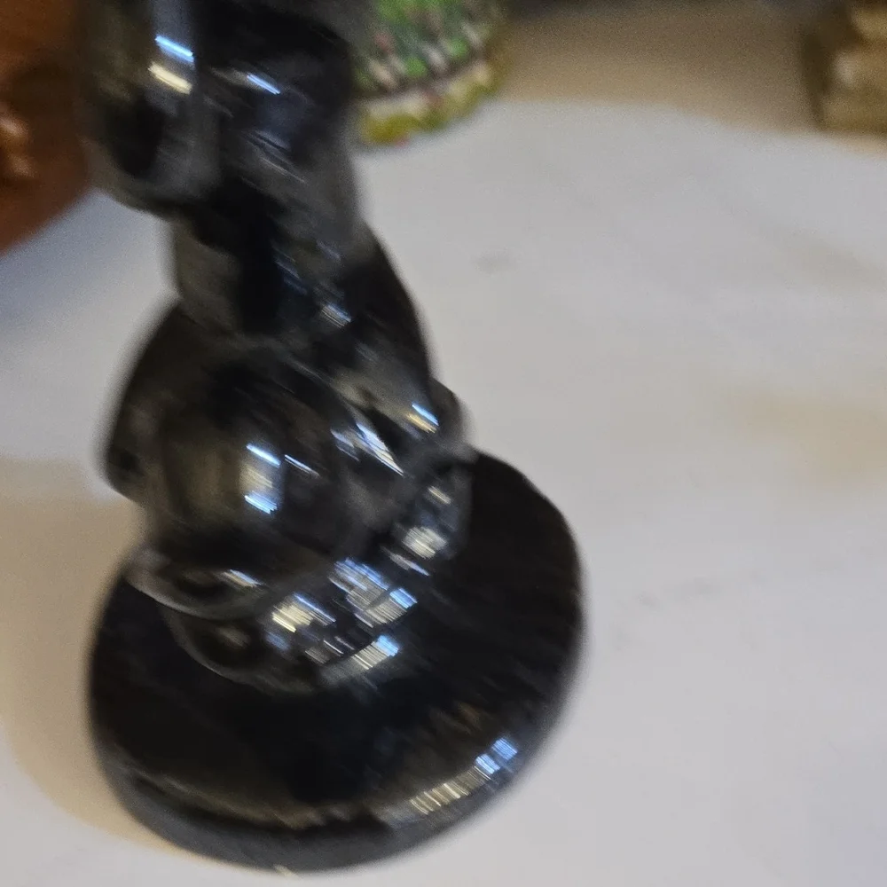 Black Ceramic Figurine with Mythical Design